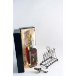 GOLF:- A modern mounted bottle cork with a golfing figure finial, a late Victorian plated toast rack