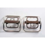 TWO SIMILAR GEORGE III LARGE MOUNTED STEEL SHOE BUCKLES of plain canted rectangular outline, each