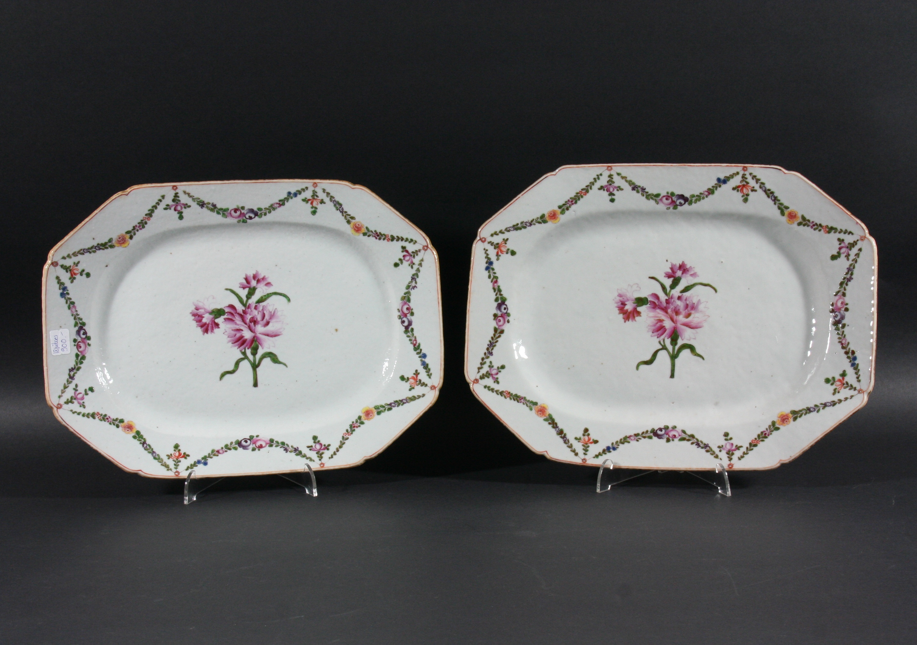 PAIR OF CHINESE EXPORT OCTAGONAL PLATTERS, late 18th century, painted with a central carnation