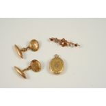 A PAIR OF 15CT. GOLD CUFFLINKS each link with foliate engraved decoration, together with an oval-