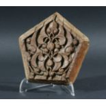 PERSIAN PENTAGONAL CARVED WOODEN PANEL, Timurid, 15th century, with scrolling arabesque