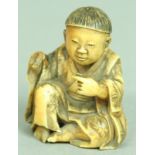 JAPANESE IVORY NETSUKE OF A BOY, lacking inset signature seal, height 4.5cm; together with another