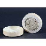 JAPANESE IVORY COMPACT AND COVER, Meiji, the cover carved with a roaring lion's head, diameter 6.