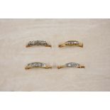 FOUR ASSORTED DIAMOND FIVE STONE RINGS all set in 18ct. gold.