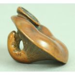 JAPANESE WOODEN NETSUKE OF A MUSHROOM, diameter 4.3cm; together with another of a basket of fruit