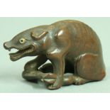 JAPANESE WOODEN NETSUKE OF A TIGER, signed, height 3cm; together with another of a hyena eating a