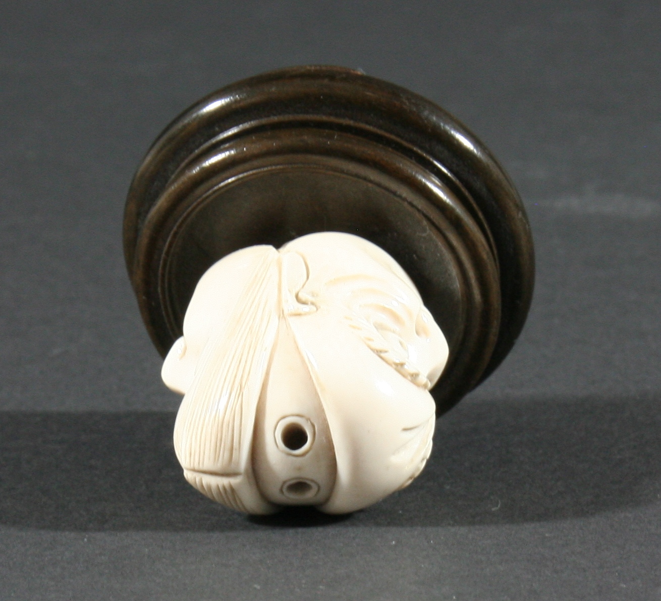 TWO JAPANESE NETSUKE, the first of a man standing with a box hung from his neck, height 5.2cm, - Image 5 of 5