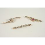 A DIAMOND AND PEARL FOLIATE BROOCH set with rose-cut diamonds and small pearls, in gold, 4.5cm.