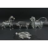 FOUR NOVELTY GLASS FRIGGERS, modelled as a horse, pig, hound and a pair of bellows, lengths 27cm and