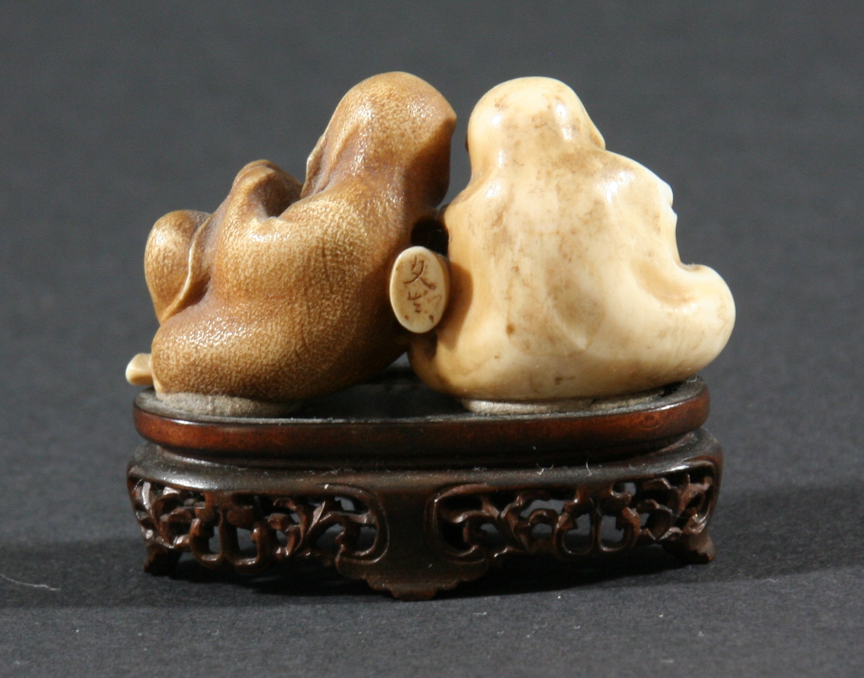 THREE JAPANESE NETSUKE, the first carved as a kneeling lady, height 3.5cm, together with a man - Image 6 of 6