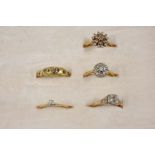 FIVE ASSORTED DIAMOND RINGS set in gold.