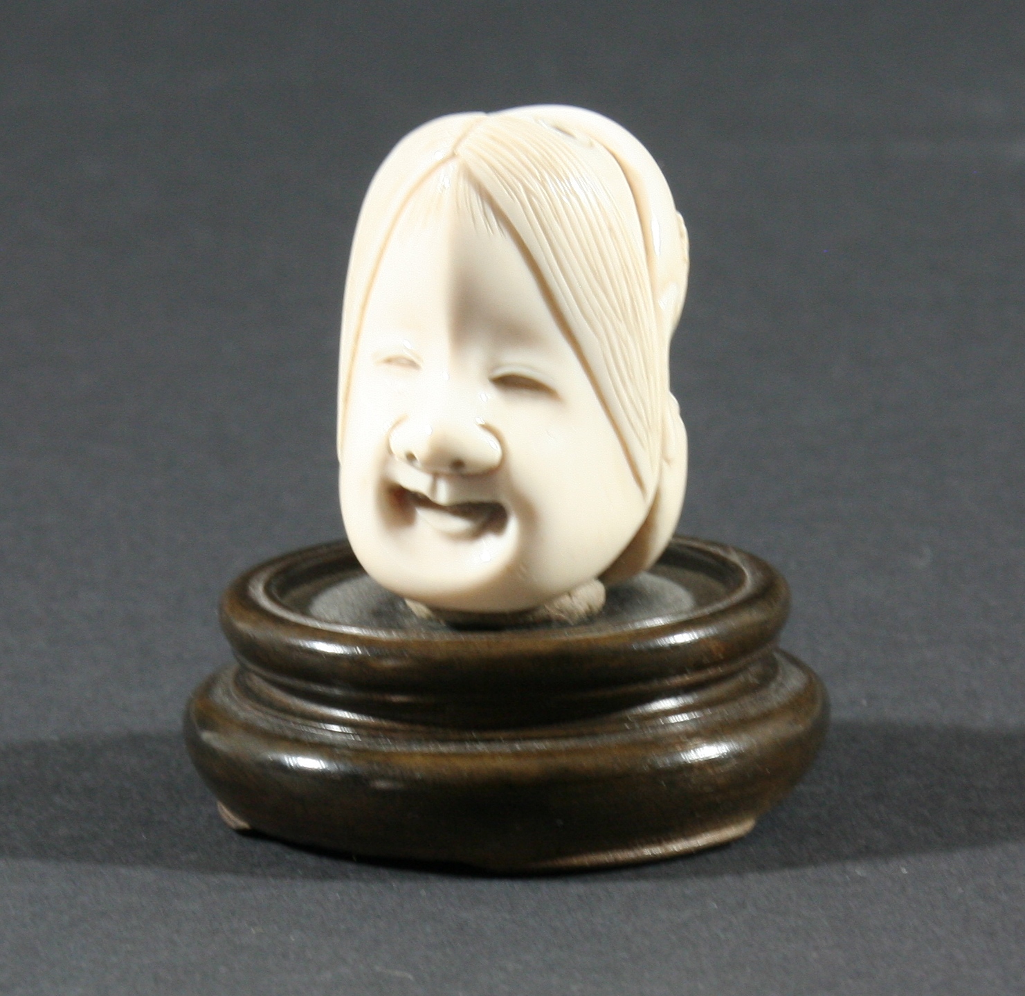 TWO JAPANESE NETSUKE, the first of a man standing with a box hung from his neck, height 5.2cm, - Image 4 of 5