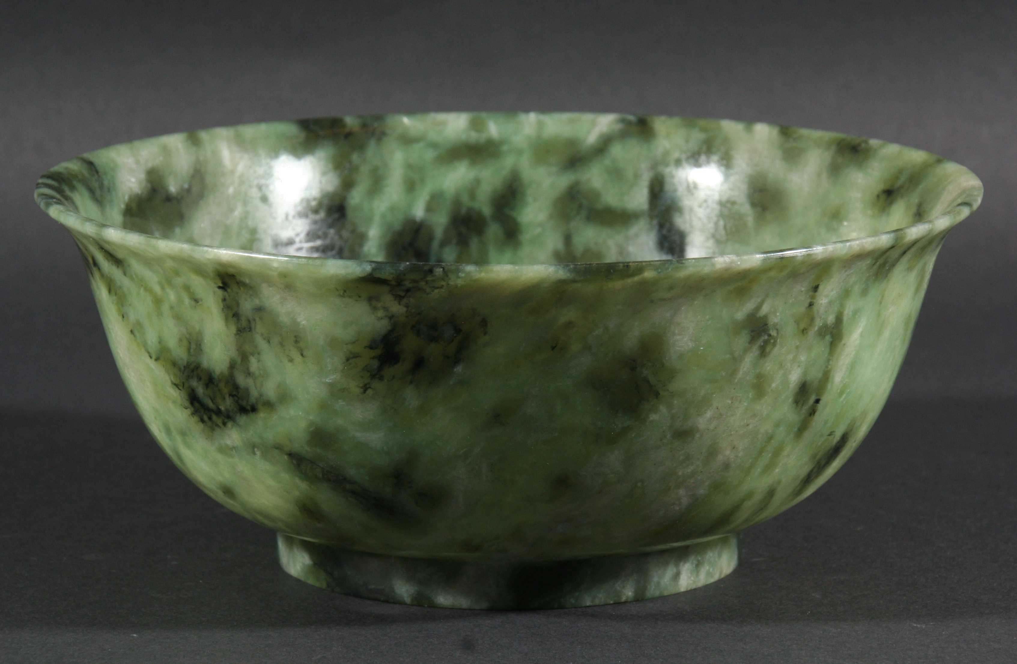 CHINESE SPINACH JADE BOWL, with everted rim and short straight foot rim, diameter 21cm