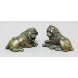 PAIR OF EUROPEAN BRONZE LIONS, probably late 18th century, recumbent facing to left and right,