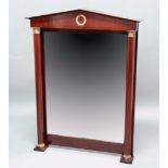 FRENCH EMPIRE STYLE MAHOGANY AND ORMOLU MIRROR, the bevelled rectangular plate beneath a temple