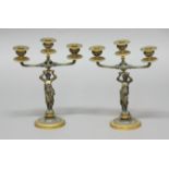 PAIR OF FRENCH EMPIRE STYLE BRONZE CANDELABRA, modelled as classical maidens holding up a triple