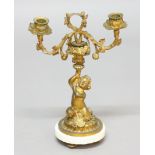 FRENCH ORMOLU AND WHITE MARBLE MOUNTED CANDELABRUM, mid 19th century, a kneeling satyr holding up