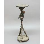 BLACKAMOOR STAND, earlier 19th century, carved as a boy climbing a tripod tree, height 90cm