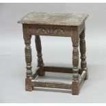 OAK JOINT STOOL, probably 18th century, with lunette carved frieze, turned legs and stretchers,