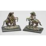AFTER COUSTOU, Pair of Marley Horse groups, bronze on black marble bases, height including base 20cm