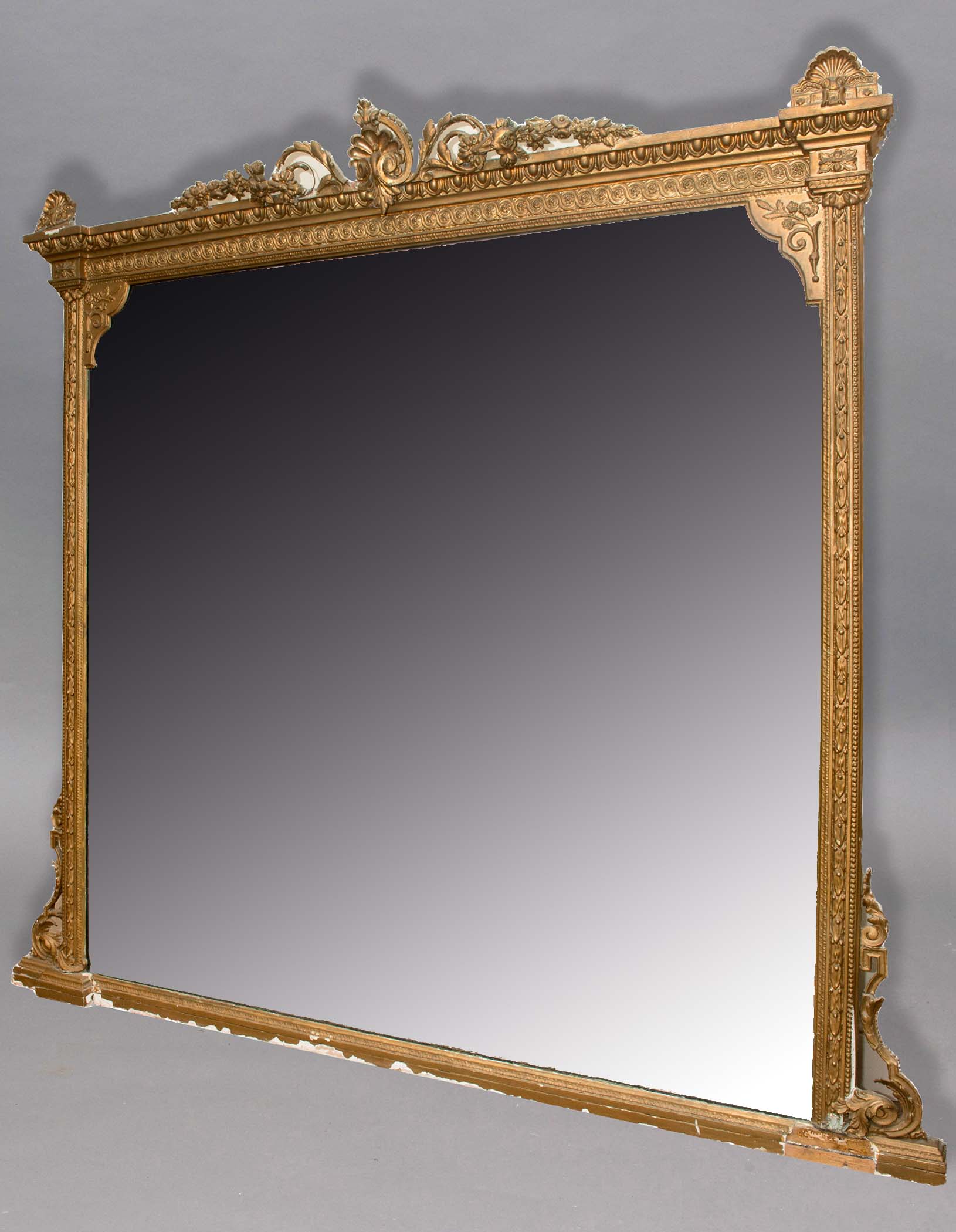 NEO-CLASSICAL GILT GESSO OVER MANTEL MIRROR, 19th century, the rectangular plate flanked by harebell