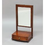REGENCY STYLE MAHOGANY TOILET MIRROR, 19th century, the rectangular plate on a bow fronted base with