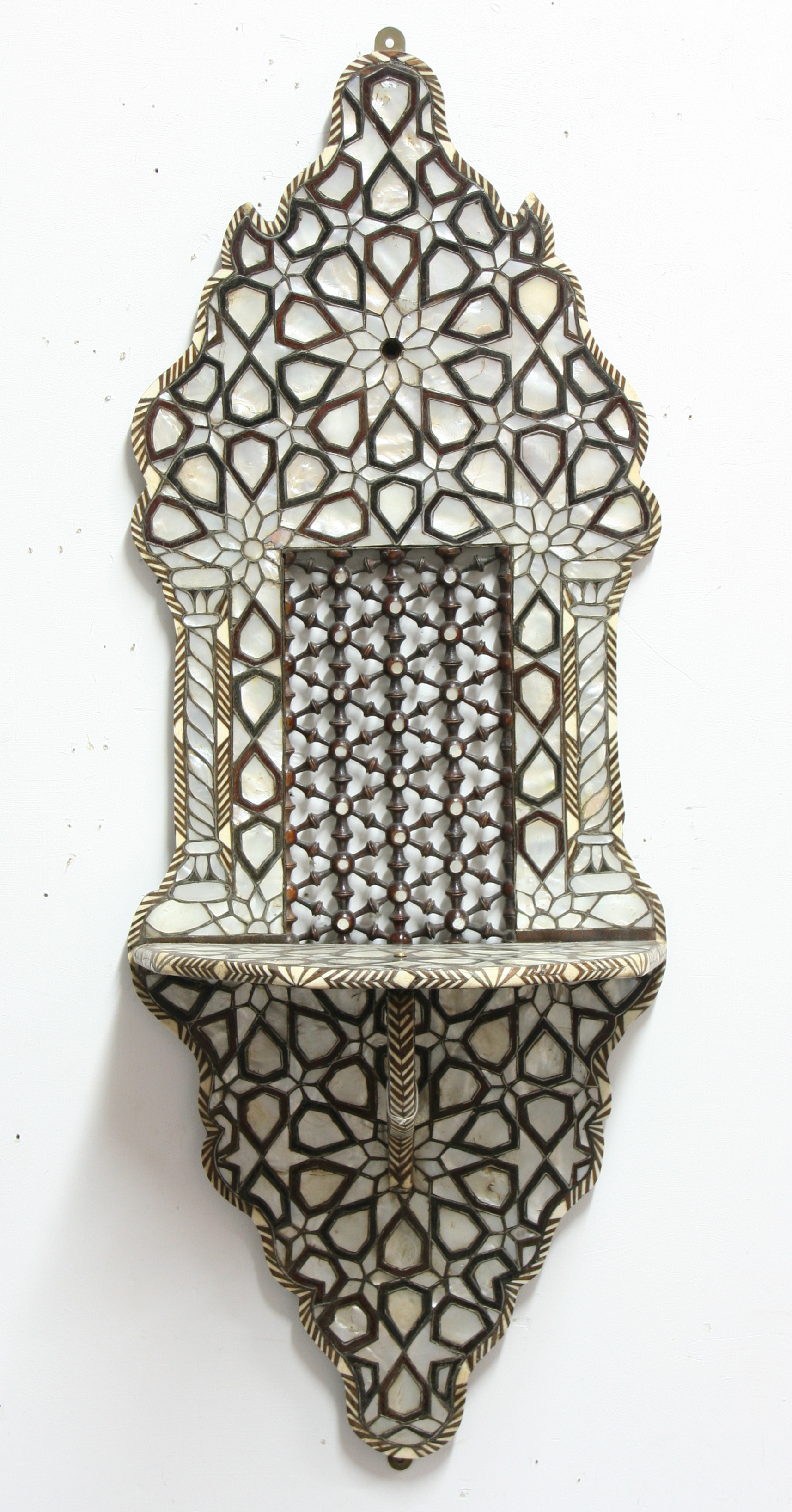 PERSIAN WALL BRACKET, a central fretwork panel surrounded by a mother of pearl and bone inlaid frame