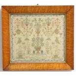 EARLY VICTORIAN SAMPLER, by Ann Holloway, dated 1844, worked with vases of flowers and birds