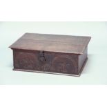 OAK BIBLE BOX, 17th century, the front initialled WB beneath fleurs de lys and bands of hearts,