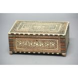 MIDDLE EASTERN DRESSING BOX, early 20th century, bone inlaid with scrolling floral and geometric