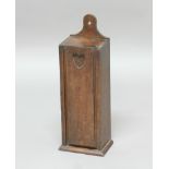 MAHOGANY CANDLEBOX, possibly 18th century, of rectangular section, the sliding front with heart