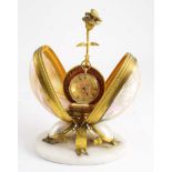 A VICTORIAN GILT BRASS & MOTHER OF PEARL WATCH STAND on marble base; 19.5 cms high, together with