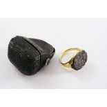 A GOLD SEAL RING inset with a steel matrix, engraved with an intaglio coat of arms*, unmarked,