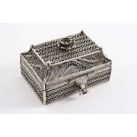 A 19TH CENTURY RUSSIAN SMALL FILIGREE CASKET with a flower finial & a hasp & staple closure,
