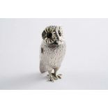 A VICTORIAN NOVELTY PARCELGILT PEPPER in the form of an owl with textured plumage, pull-off head &