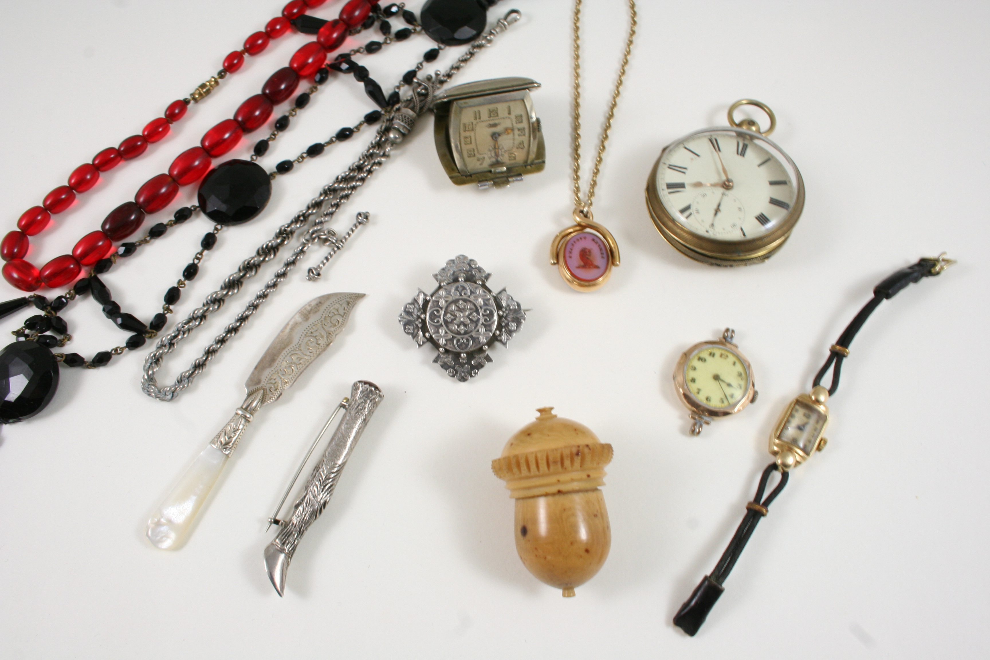 A QUANTITY OF JEWELLERY including a lady's 9ct. gold wristwatch, a spinning fob set with a