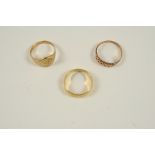 A GOLD SIGNET RING size K 1/2, together with two other gold rings, total weight 7.7 grams.