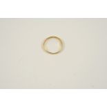 A GOLD POSY RING inscribed to the inside Vertue Passeth Riches, 1.6 grams. Size N.