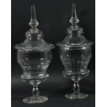 PAIR OF GLASS BON-BON JARS AND COVERS, early/mid 19th century, of faceted urn form on a baluster