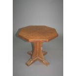 ROBERT THOMPSON OF KILBURN - MOUSEMAN SIDE TABLE an octagonal side table, made in oak with a central