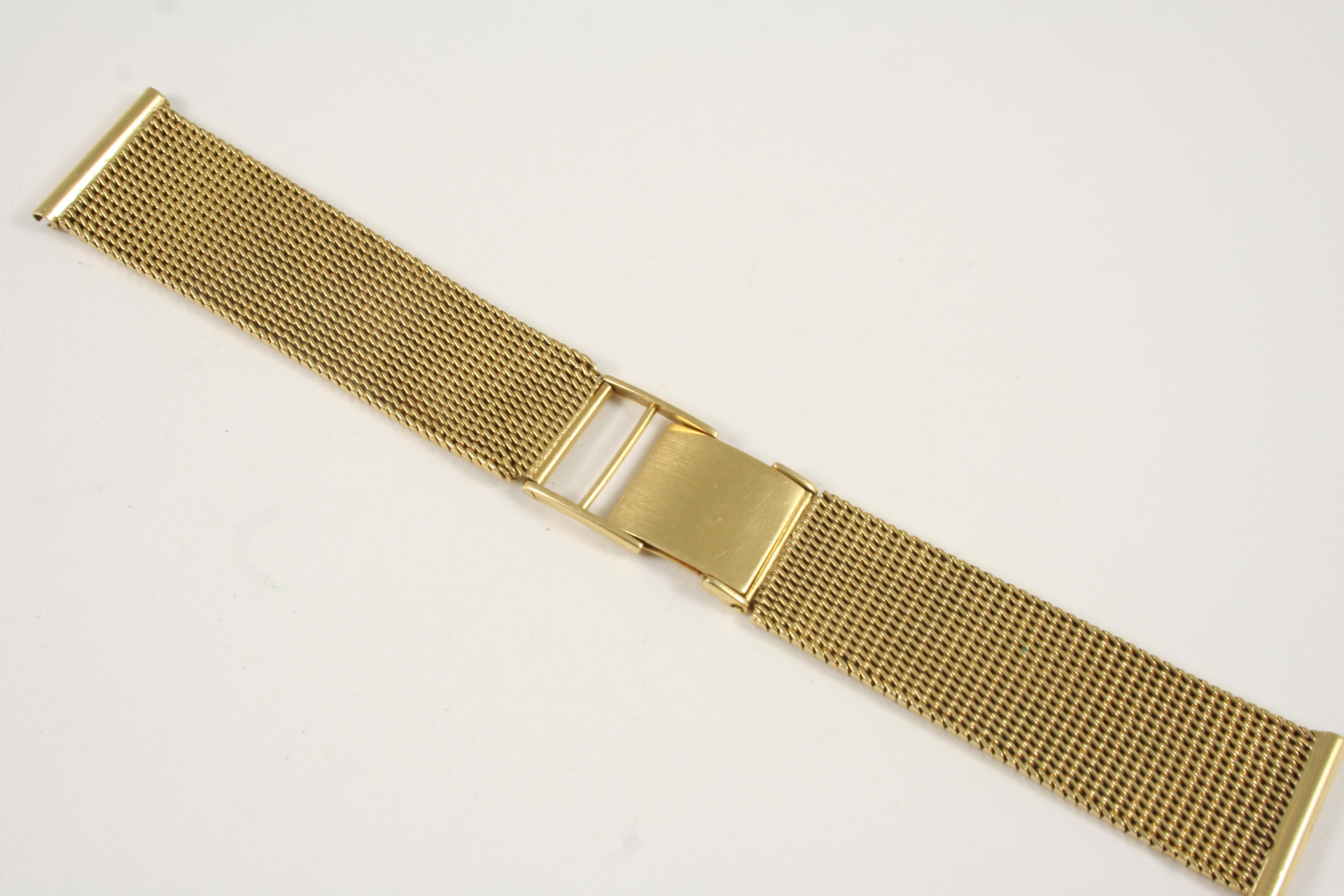 AN 18CT. GOLD WRISTWATCH STRAP of mesh design, with ladder clasp, 13.5cm. long, 37.6 grams.