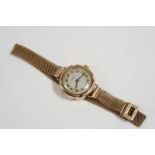 A LADY'S 9CT. GOLD WRISTWATCH BY J.W. BENSON the signed circular dial with Arabic numerals, on a