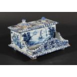 DUTCH DELFT INKSTANDISH, later 18th century, with ink well and pounce pot, four quill holders and