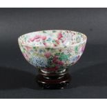 CHINESE THOUSAND FLOWER BOWL, Qianlong style but later, in the famille rose palette, iron red four