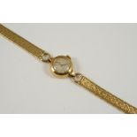 A LADY'S 18CT. GOLD WRISTWATCH BY ROLEX the signed circular dial with baton and dagger numerals,