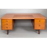 GORDON RUSSELL - LARGE PEDESTAL DESK, 1963 a large teak desk, the top with a partial leather