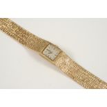 A LADY'S 9CT. GOLD WRISTWATCH BY JEAN RENET the signed square-shaped dial with baton numerals, on an