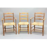 SET OF COTSWOLD SCHOOL DINING CHAIRS the slat back chairs made in oak and with woven seats, with a