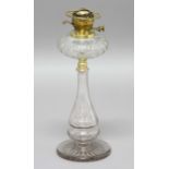 VICTORIAN GLASS OIL LAMP, the ovoid reservoir with oval facets, on a slumped baluster glass column