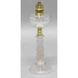 VICTORIAN GLASS OIL LAMP, the hemi-spherical reservoir on a tapering faceted glass column and